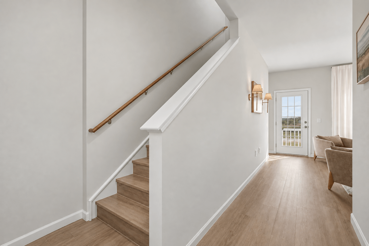 calm neutral hallway with staircase